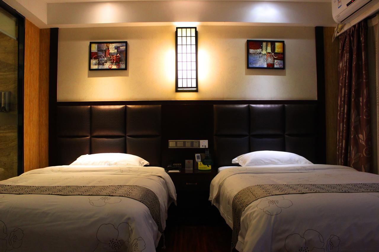 Guangzhou Wellgold Hotel Rom bilde